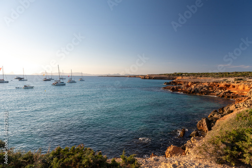 Boats in thebeach of Cala Saona in Formentera in Spain in the summer 2021.