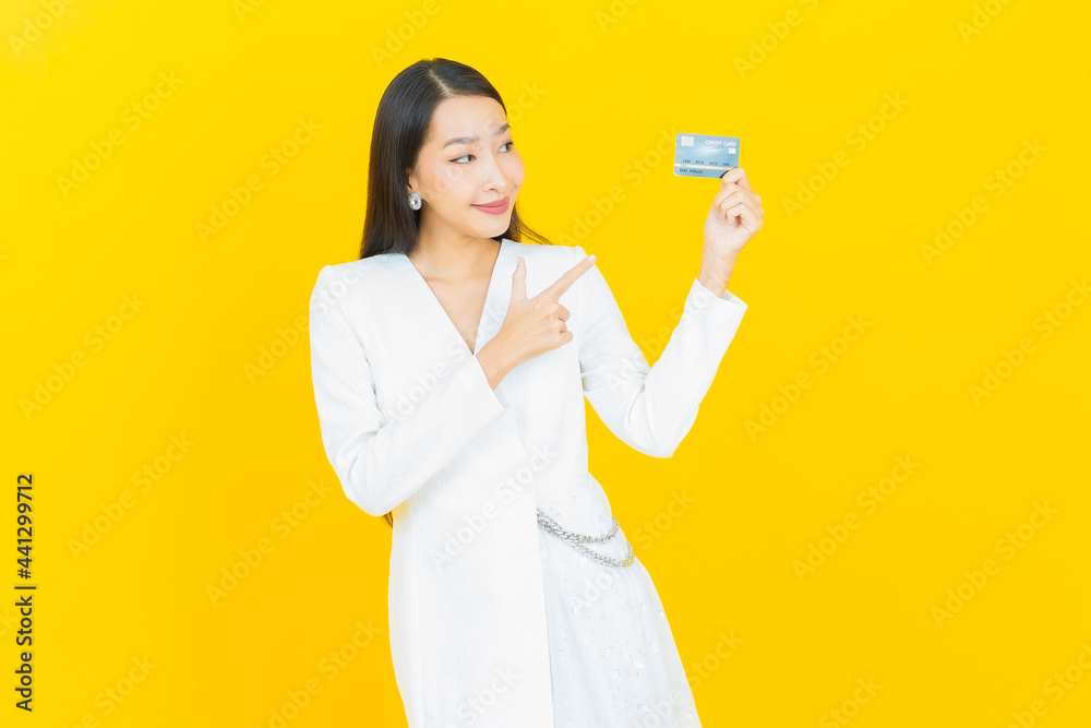 Portrait beautiful young asian woman smile with credit card Portrait beautiful young asian woman smile with credit card