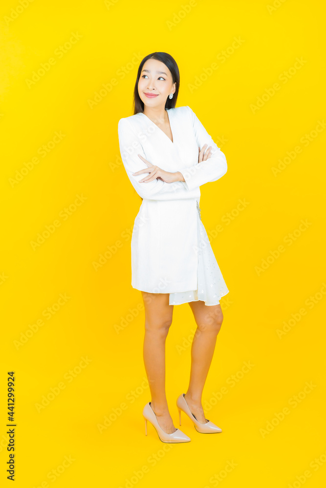 Portrait beautiful young asian woman smile with action Portrait beautiful young asian woman smile with action
