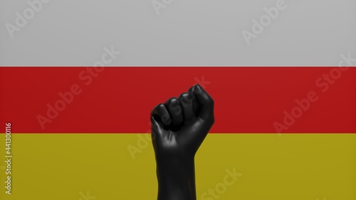 A single raised Black Fist in the center in front of the Country Flag of South Ossetia