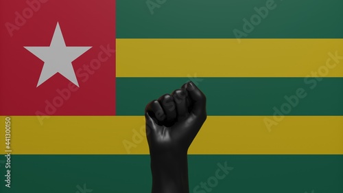 A single raised Black Fist in the center in front of the Country Flag of Togo