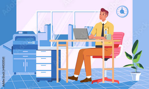 young man working with laptop in the office with office interior and equipment in the background