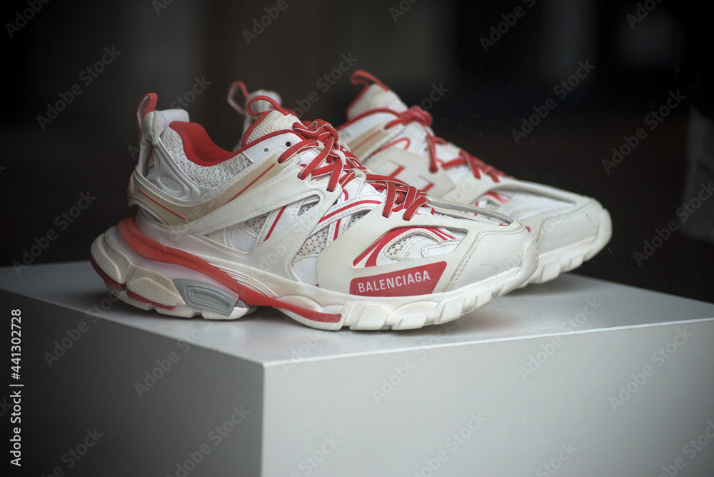 Mulhiuse - France - 23 June 2021 - Closeup of red and white sneakers by the  famous italian brand Balenciaga in a fashion store showroom Stock Photo |  Adobe Stock