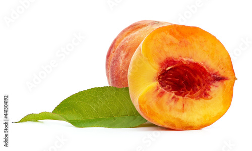 Sliced peach and leaves.