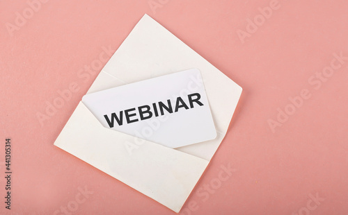 Word Writing Text WEBINAR on card on the pink background