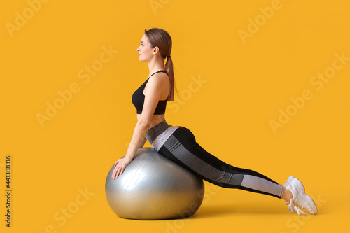Sporty young woman training...