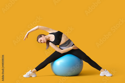 Sporty young woman training...