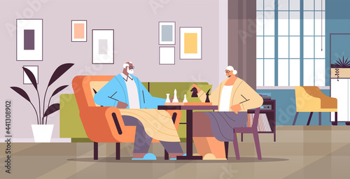 elderly couple playing chess senior man woman spending time together