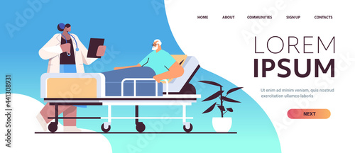 nurse taking care of sick senior man patient lying in hospital bed care service concept horizontal