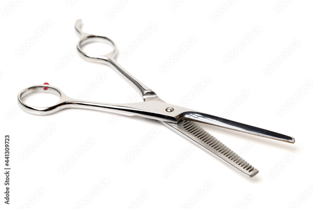 hairdressing scissors on an isolated white background hairdressing scissors on an isolated white background