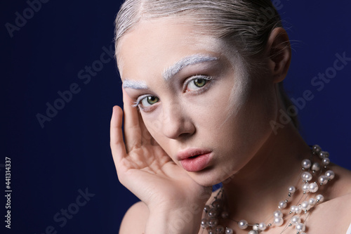 Beautiful young woman with ...