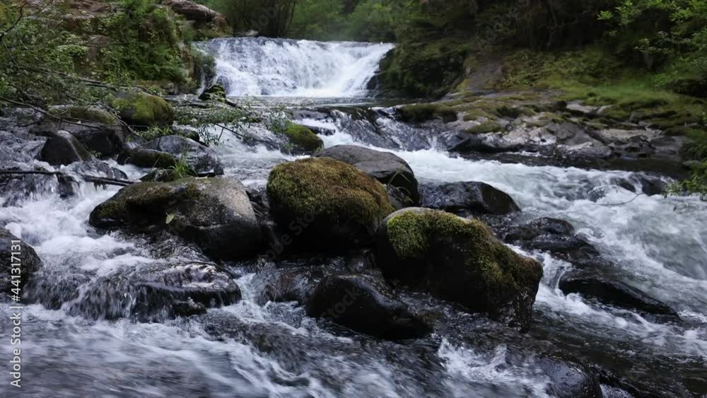 Relaxing view of waterfall at Sweet Creek flowing in Oregon through the wilderness. Relaxing view of waterfall at Sweet Creek flowing in Oregon through the wilderness.