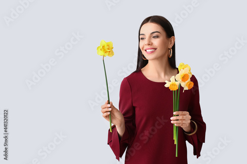 Beautiful young woman with ...