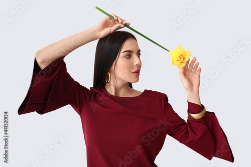 Beautiful young woman with ...