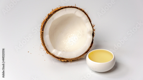 Coconut oil with a half of a coconut