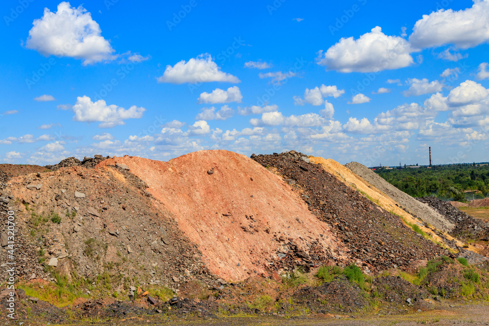 View of slag heaps of iron ore quarry. Mining industry