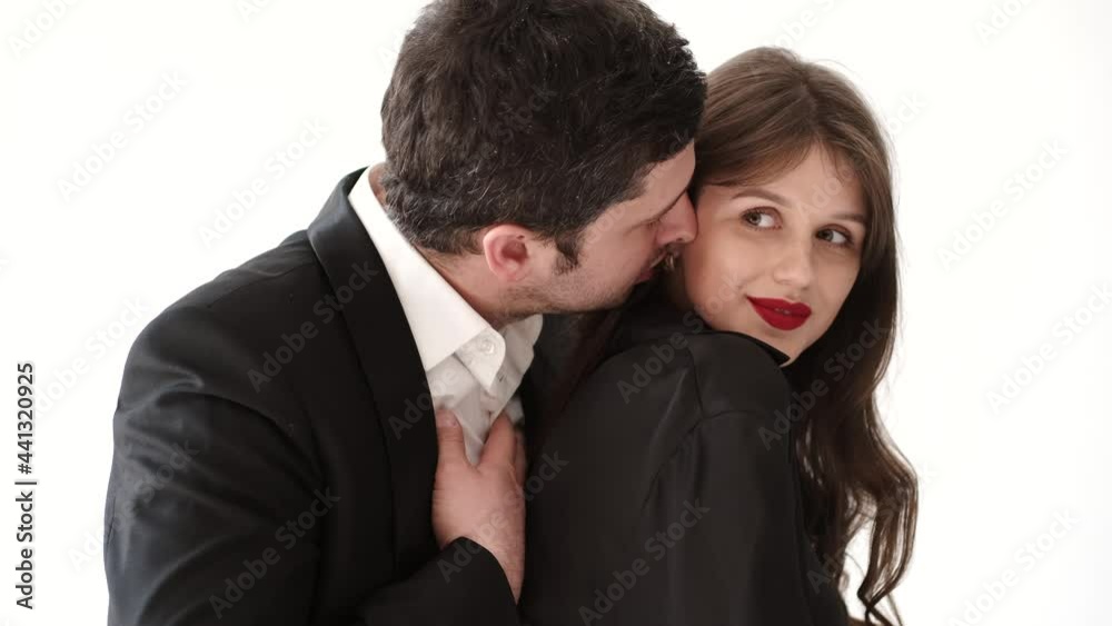 Side view shot of a romantic couple getting closer to each other Side view shot of a romantic couple getting closer to each other