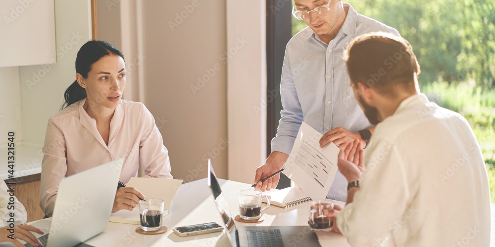 Fototapeta premium Cropped portrait of professional managers making presentation