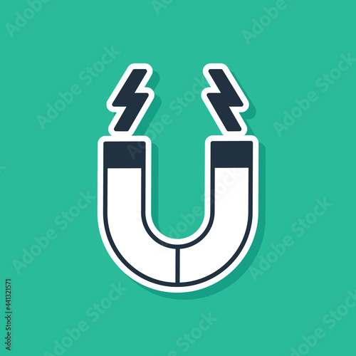 Blue Magnet icon isolated on green background. Horseshoe magnet, magnetism, magnetize, attraction. Vector