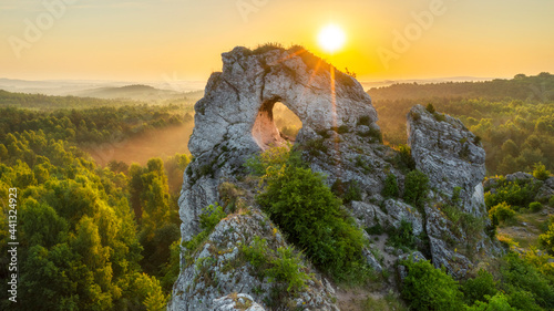 Okiennik wielki rock during sunrise - Jura Krakowsko-Czestochowska - Poland photo