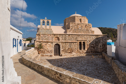 The ancient church of Agios Ioannis Chrysostomosnel in the traditional village of Chorio on the Greek island of Kimolos in the Cyclades archipelago photo