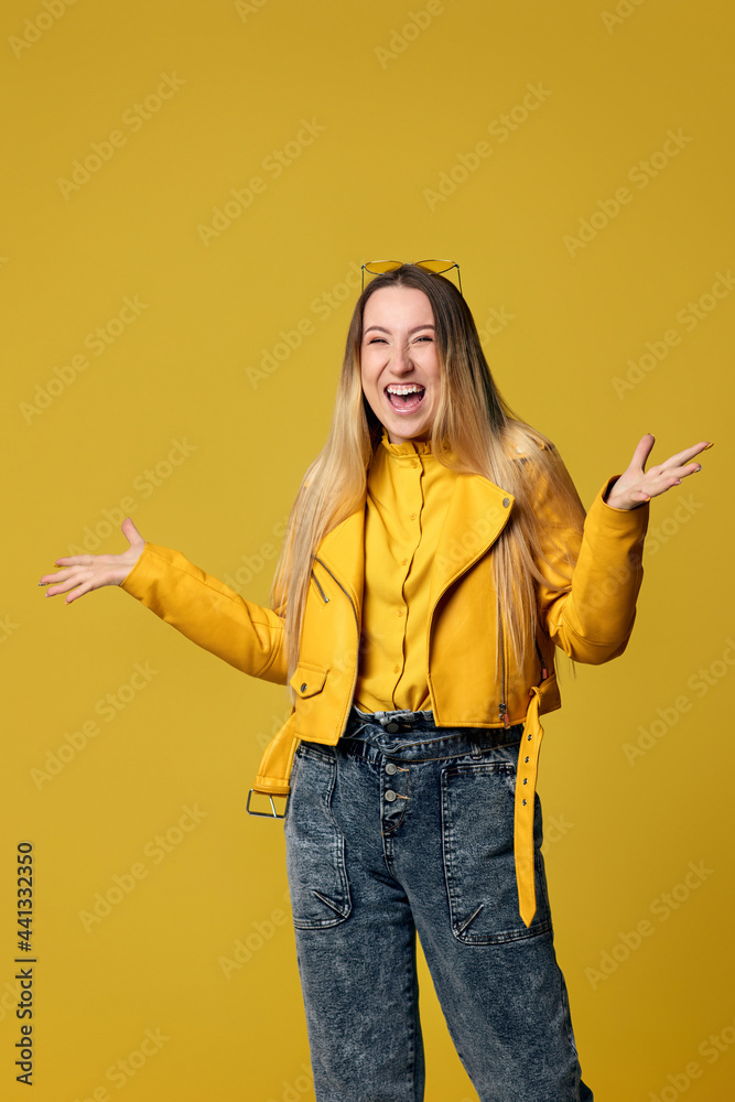 happy woman screaming on yellow background. Human emotions happy woman screaming on yellow background. Human emotions