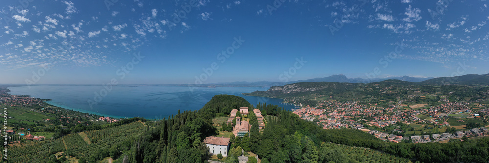 Aerial panorama Monastery on the hill. Monastery on the Eremo di San Giorgio hill,.Lake Garda, Italy. Aerial view of Eremo di San Giorgio, Bardolino. Home of Italian monks, lake garda.