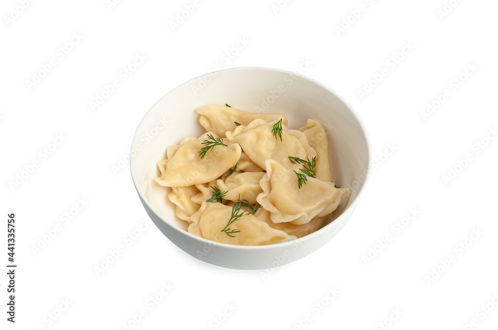 Boiled dumplings with potatoes and mushrooms. Decorated with greenery. White plate. View from above. White background. Isolated. Boiled dumplings with potatoes and mushrooms. Decorated with greenery. White plate. View from above. White background. Isolated.