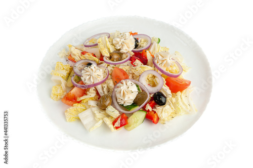 Greek salad with Chinese cabbage and curd cheese. Close-up, top view. White background.