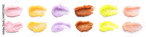Set with smears of different body scrubs on white background. Banner design photo