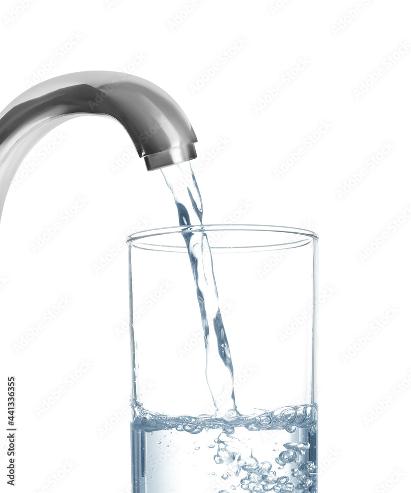 Filling glass with water from tap on white background Filling glass with water from tap on white background