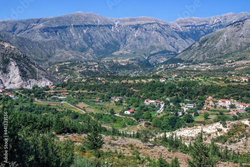 Summer landscape -Albanian mountains, covered with green trees and blue sky