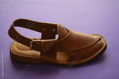 A very comfortable and elegant pair of brown handmade sandals of Peshawar, Pakistan