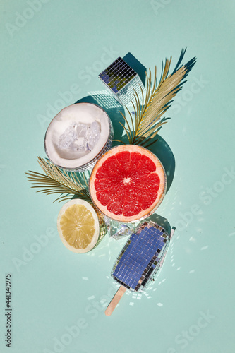 Disco balls as extic fruits. Creative conceptual background. Top view. Flat lay, photo