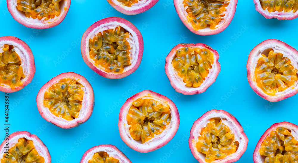 Passion fruit on blue background. Top view