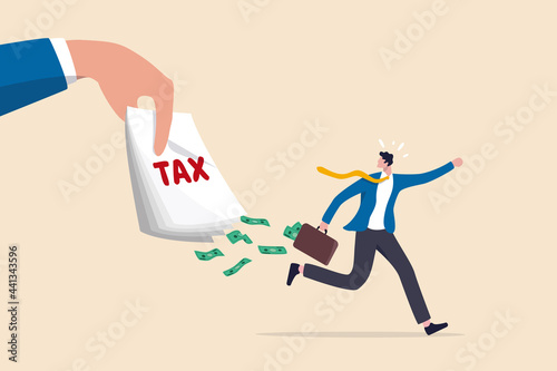 Tax evasion, illegal hide revenue and avoid paying government tax, fraud and money laundering or financial crime concept, frustrated businessman run away with full of money banknotes from tax bills. photo