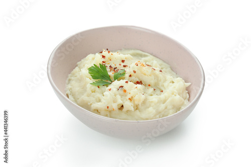 Plate of mashed potatoes isolated on white background