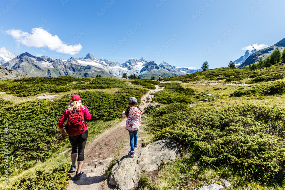 Amazing view of touristic trail near the Matterhorn in the Swiss Alps.