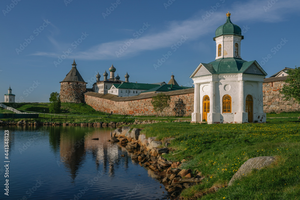 Naklejka premium View of the chapel of the Holy Prince Alexander Nevsky at the Solovetsky Monastery from the White Sea Bay on a sunny summer day, Solovetsky Island, Arkhangelsk region, Russia