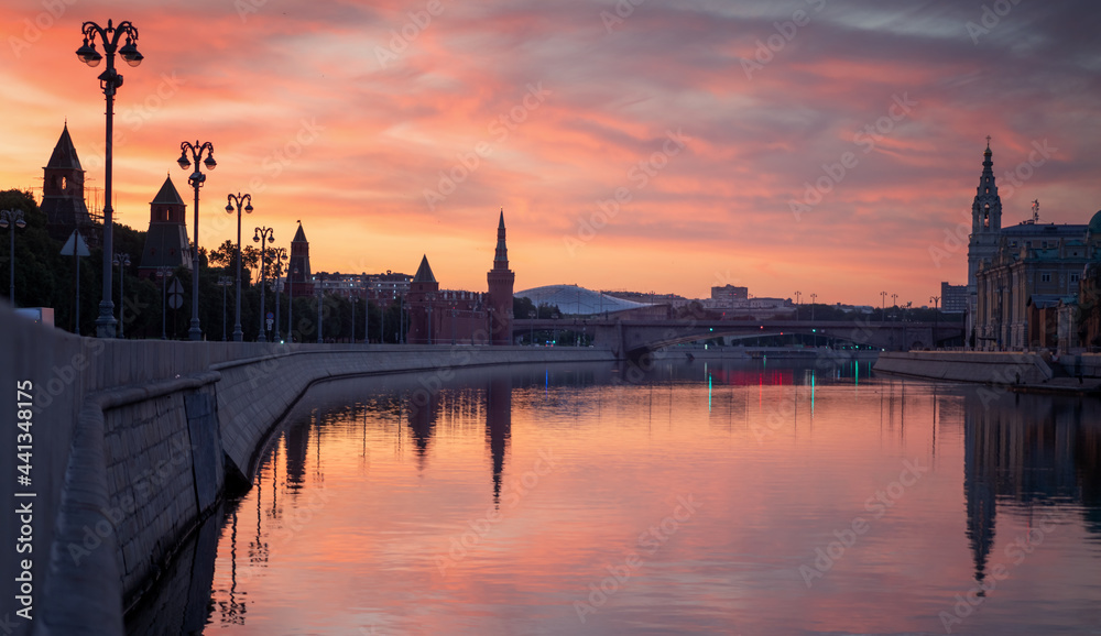 View of the Moscow towers and cathedrals and reflections on the Moscow River in an early sunny golden morning View of the Moscow towers and cathedrals and reflections on the Moscow River in an early sunny golden morning