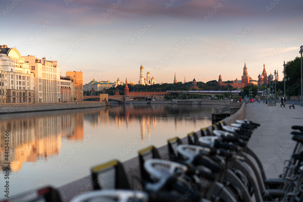 Beautiful view of the Moscow Kremlin and river embankment at sunrise