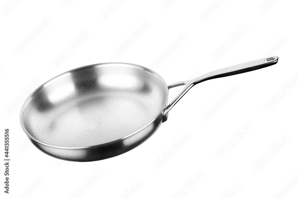 A stainless steel frying pan is isolated on a white background. A stainless steel frying pan is isolated on a white background.