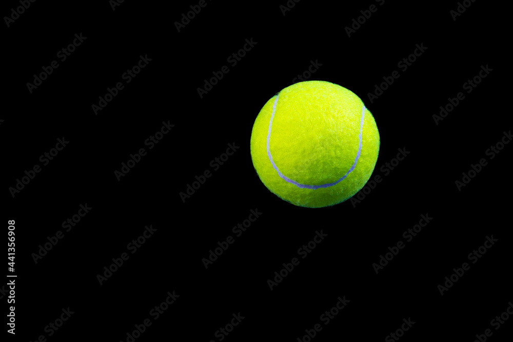 tennis ball isolated on black