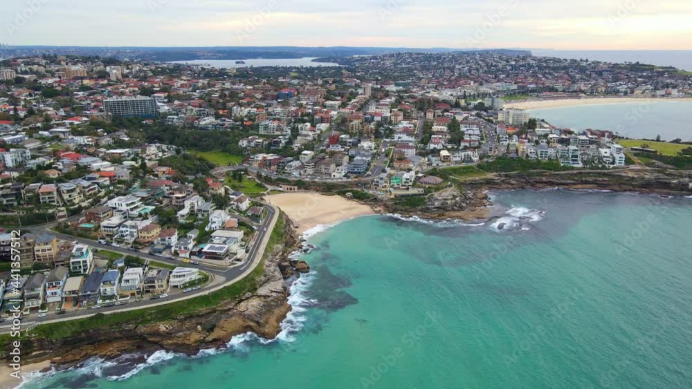 Aerial View Of Tamarama Beach By Tranquil Blue Water Of Sea - Tamarama Point In NSW, Australia. - pulback Aerial View Of Tamarama Beach By Tranquil Blue Water Of Sea - Tamarama Point In NSW, Australia. - pulback