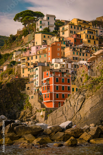 View of Riomaggiore Cinque Terre sequence of hill cities. Wonderful view of Liguria, Italy, Europe. seascape of the Mediterranean sea. Traveling concept background. Riomaggiore Cique Terre Italy photo