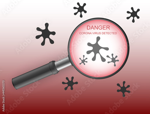 Magnifying glass and danger warning against corona virus