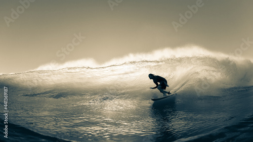 Surfing Surfer Riding Wave Back-light Sepia Water Action Close-Up Panoramic Photo.