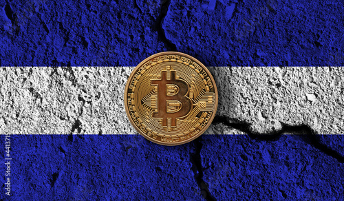 Bitcoin crypto currency coin with cracked El Salvador flag. Crypto restrictions