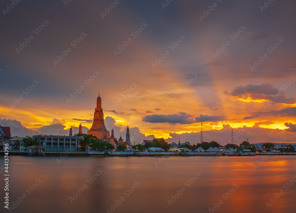 sunset over the river at  wat Arun Bangkok Thailand.