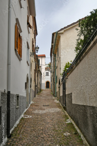 A small street between the old houses of Agnone, a medieval village in the mountains of the Molise region, Italy. © Giambattista
